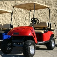 EZ-GO Lifted Red 36 Volt Electric Golf Cart